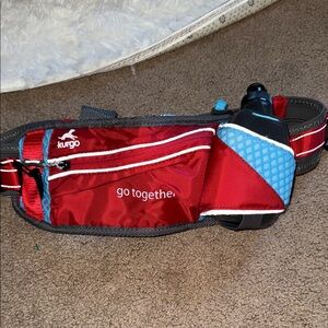 Kurgo Red and Blue Belt Bag on trail running belt